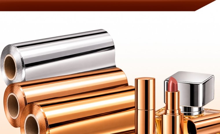 Hot stamping foil reels with foil-decorated lipstick case, perfume bottle and caps